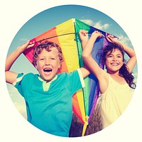 Cheerful Children Playing Kite Outdoors Concept