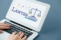 Hands using laptop with scale icon and legal court word concept