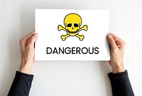 Hands holding placard skull icon and toxin dangerous word