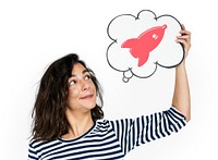 Woman holding thinking bubble with spaceship icon