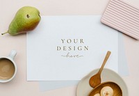 White card mockup on a pastel pink table