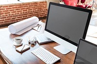 Computer screen on a wooden table