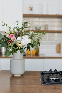 Elegant modern kitchen with a flower pot