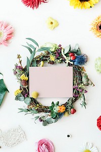 Botanical wreath with a pink card
