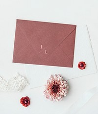 Pale red envelope with flowers