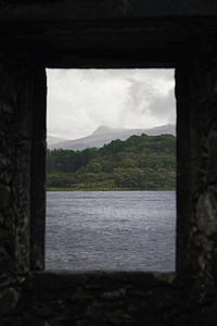 Sea view through a rocky window of Kilchurn Castle, Scotland
