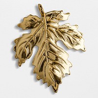 A gold leaf Christmas ornament isolated on gray background