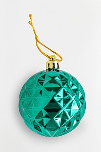 A shiny green ball Christmas ornament isolated on gray background