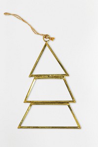 A gold wire Christmas tree ornament isolated on gray background