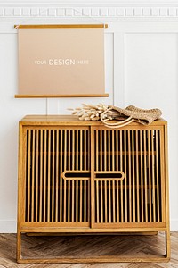 Picture frame mockup on a wooden cabinet