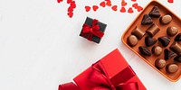 Chocolates by a box of red present social banner