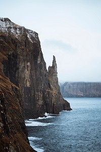View of Tr&oslash;llkonufingur or Witches Finger, island in the Faroe Islands