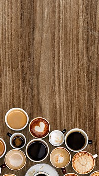 Mixed coffee mugs on a brown textured background