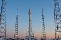 JCSAT&ndash;14 (2016). Falcon 9 and JCSAT&ndash;14 spacecraft vertical on Pad 40, Cape Canaveral, FL. Original from Official SpaceX Photos. Digitally enhanced by rawpixel.