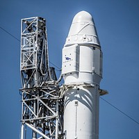 CRS&ndash;8 (2016). Falcon 9 and Dragon vertical on Pad 40 at Cape Canaveral, FL. Original from Official SpaceX Photos. Digitally enhanced by rawpixel.