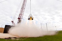 Dragon 2 hover test (2015). Propulsive hover tests of our Dragon 2 vehicle that can carry crew and cargo. Original from Official SpaceX Photos. Digitally enhanced by rawpixel.