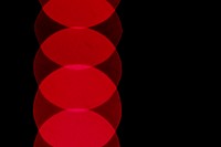 Red blurred lights on a black background