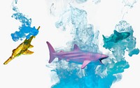 Cyan acrylic ink dissolving background shark pattern