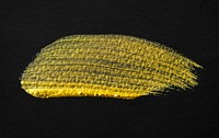 Gold metallic brush stroke on black background