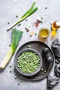 Fresh organic peas in a bowl