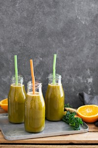 Fresh ginger carrot and kale smoothie food photography