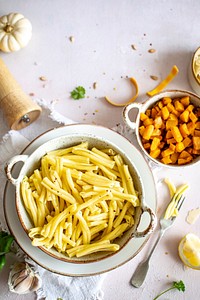 Cooked casarecce pasta in a bowl aerial view