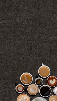 Various coffee mugs on a black grunge textured background