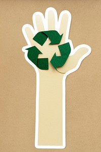 Hand holding a recycle symbol paper craft sticker