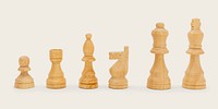Light wood chess pieces on a beige background