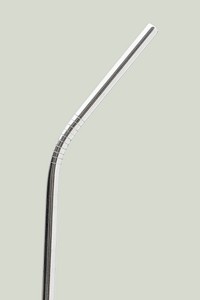 Reusable stainless steel straws on off white background
