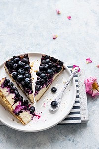 Closeup of a homemade blueberry cheese cake. Visit <a href="https://monikagrabkowska.com/" target="_blank">Monika Grabkowska</a> to see more of her food photography.