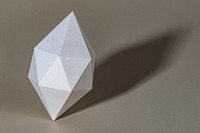 3D silver octahedral polyhedron shaped paper craft on a gray background