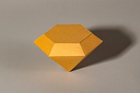 3D golden diamond shaped paper craft on a gray background