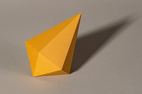 3D golden asymmetric hexagonal bipyramid paper craft on a gray background