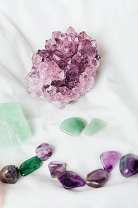 Colorful healing crystals on a blanket 