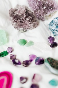 Colorful healing crystals on a blanket 