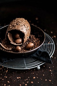 Brown homemade Easter chocolate eggs in a bowl