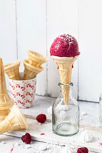 Raspberry ice cream cone in a a glass bottle