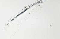 Water splash with drops on a gray background