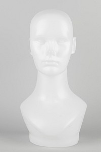 White mannequin head on a gray background