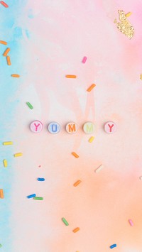 Yummy beads text typography on colorful background