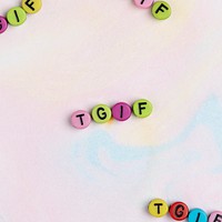 TGIF beads word typography on pastel