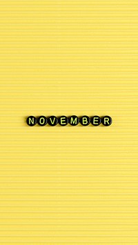NOVEMBER beads text typography on yellow
