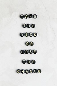 TAKE THE RISK OR LOSE THE CHANCE beads text typography