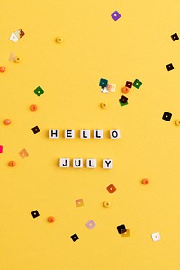 HELLO JULY beads word typography on yellow