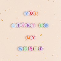 YOU LIGHT UP MY WORLD beads text typography