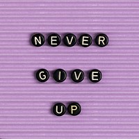 NEVER GIVE UP beads text typography