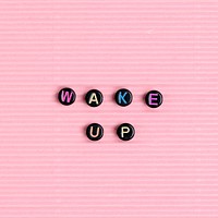 WAKE UP beads word typography on pink