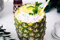 Closeup Pineapple drink with coconut cranberry syrup