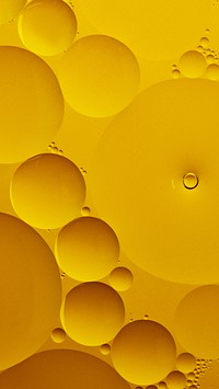 Gold phone wallpaper abstract oil bubble texture background